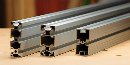 Aluminum extrusion profiles compatible with the StaySquare Guide Rail System