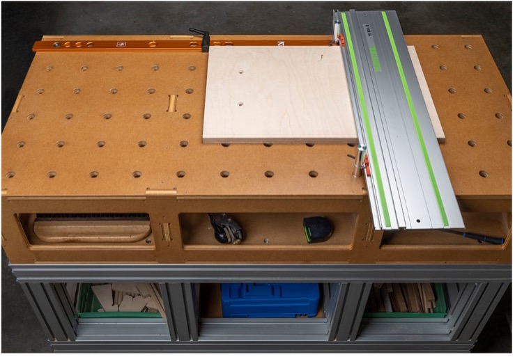 Figure 1. While this already-built aluminum extrusion table was too low to the ground for practical woodworking, adding a Paulk-style top lifted it to the just-right finished height.